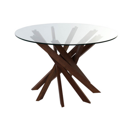 Esta impresionante mesa de comedor combina la calidez de la madera de nogal con la elegancia y transparencia del cristal, creando un ambiente sofisticado y luminoso en tu hogar. Su diseño contemporáneo, con una base escultural de madera de nogal y un tablero circular de cristal templado de 12 mm de grosor, aporta un toque de distinción a cualquier comedor. Con unas dimensiones de 120x120x76 cm, esta mesa es perfecta para espacios medianos, fomentando la conversación y la cercanía entre los comensales.