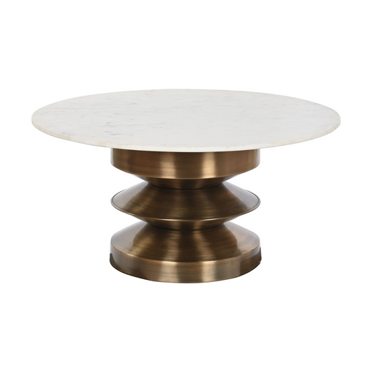 Esta mesa de centro combina la elegancia atemporal del mármol blanco con la solidez y modernidad del hierro en un diseño único y llamativo. Su base escultural de hierro en tono bronce aporta un toque de sofisticación, mientras que el tablero circular de mármol blanco ofrece una superficie resistente y fácil de limpiar. Ideal para añadir un punto focal de estilo a tu salón o sala de estar.