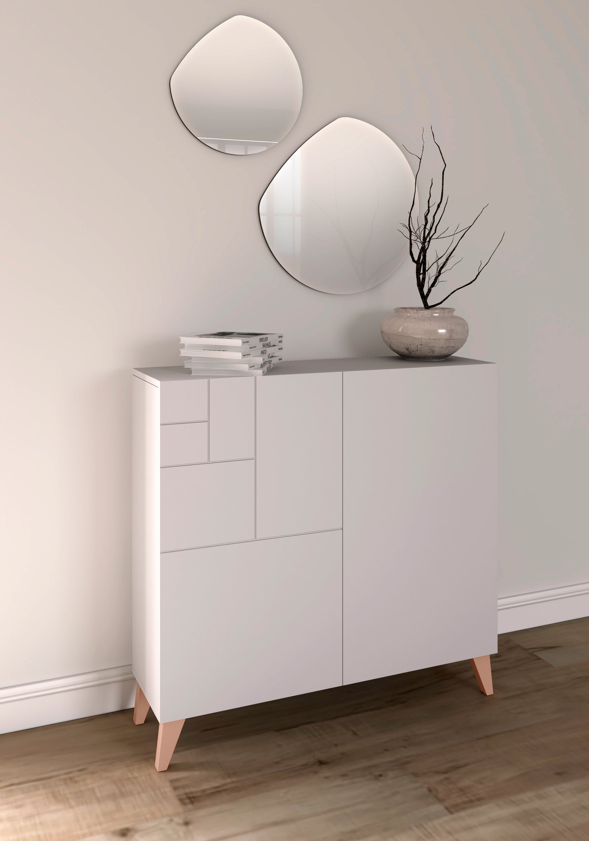 Mueble auxiliar blanco melamina con patas de madera y espejo en pared maquillaje
