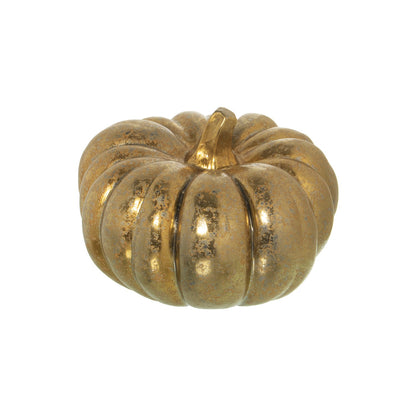 Dale un toque de brillo y elegancia a tu hogar con esta figura de calabaza en cerámica dorada. Con un acabado metálico que irradia calidez, esta pieza decorativa está disponible en dos tamaños: Ø24x15cm y Ø35x18cm. Ideal para decorar tu hogar durante el otoño, Halloween o para añadir un toque sofisticado a tu decoración durante todo el año.